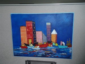 painting of boats and cit buildings