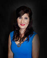 Sylvia Most Insurance Tampa Florida blue dress red lipstick