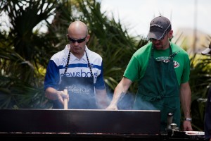 crawfish grilling two guys food in the sun Tampa Florida