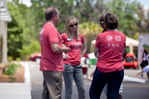 people chatting and talking with we heart FHR shirts