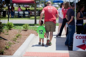 dad and son wearing shirt that says we heart FHR